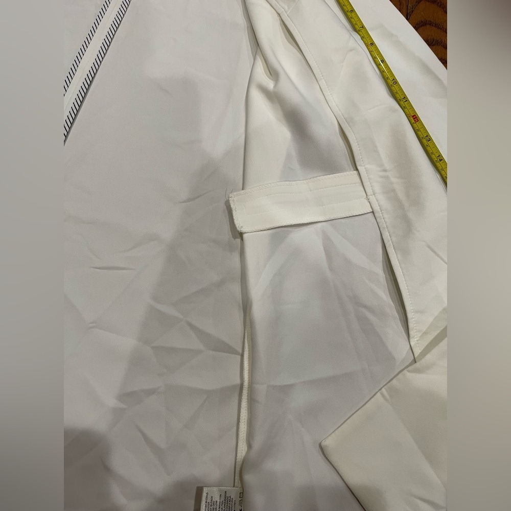 Have White Blazer 
with Striped Accents - Picture 9 of 10